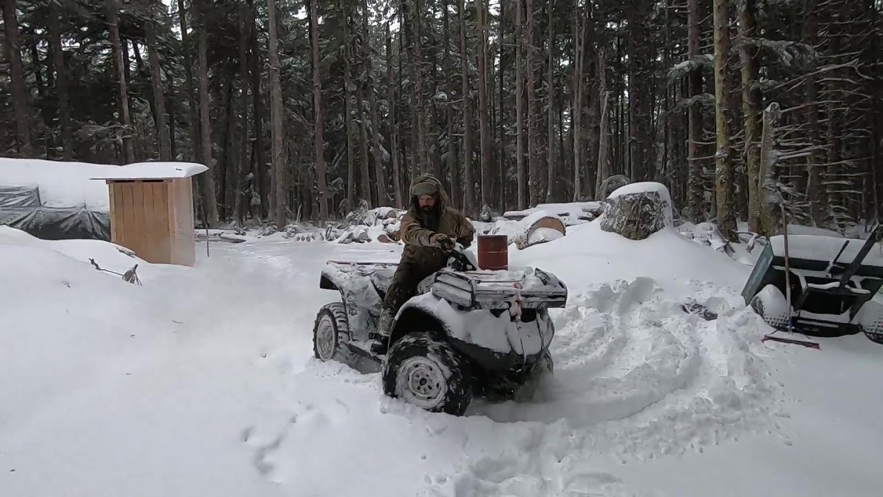 Alaska off grid cabin | First winter snow and we lost one tent and a tree