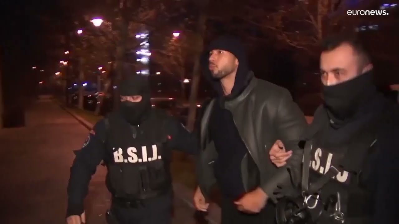 Controversial online influencer Andrew Tate arrested during a police raid in Romania