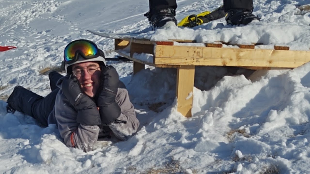 Practicing on our snowboard jump!