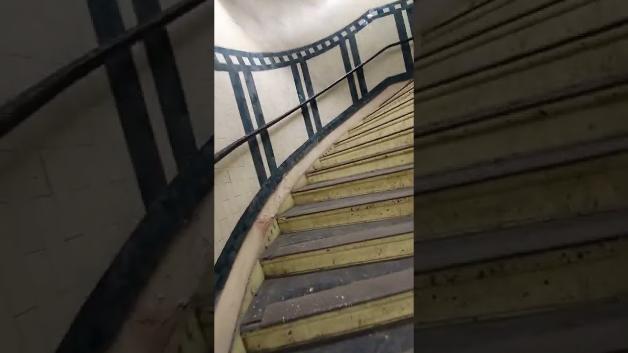 Stations | Walking up the Aldwych spiral staircase