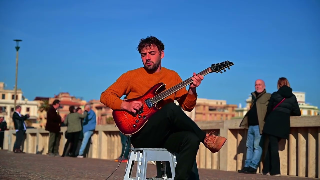 Gitarrist am Strand von Ostia
