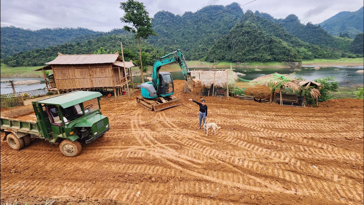 200 days alone the girl builds a new house, using excavators and dump trucks to expand the farm area