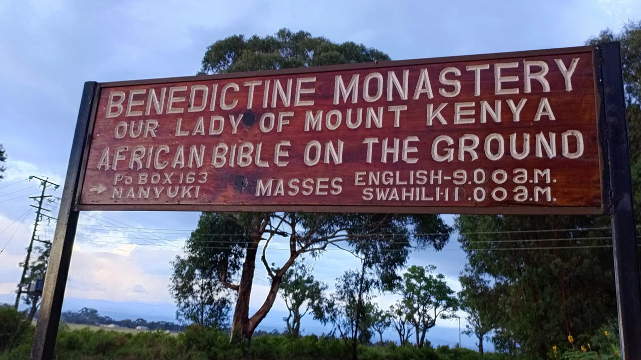 At this Nanyuki Monastery, You Walk Among Biblical Scriptures African Bible on the ground.