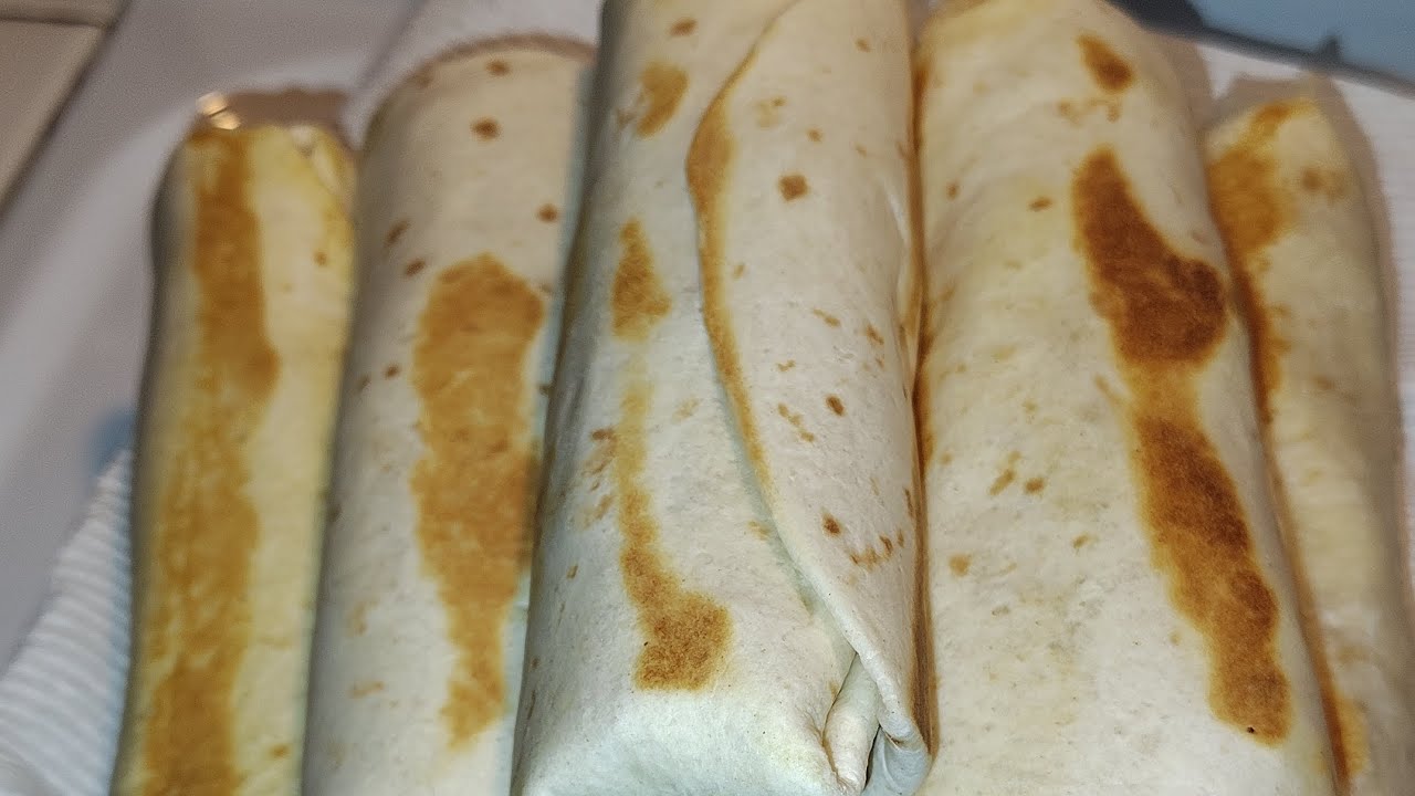 Making potato egg and cheese burritos #breakfast #fypシ゚viral #food 