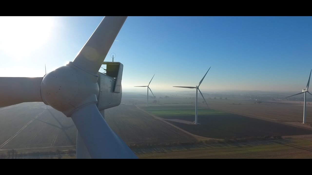 Flying Through Moving Wind Turbines (no joke) HD Drone footage
