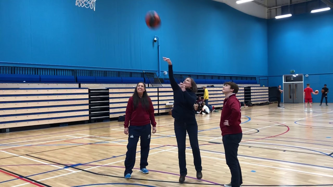 Jo Stevens MP playing basketball with Stef Collins