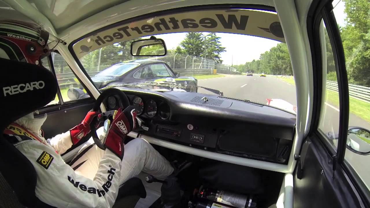 Leh Keen driving a 74 Porsche RSR in the 2014 LeMans Classic