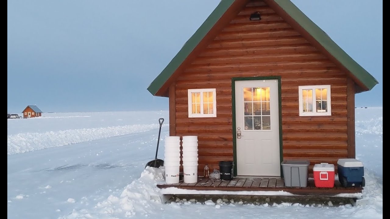 Ice fishing in a log cabin!  Glamping on Lake of the Woods day 3 at Bostic Bay Luxury Ice Cabins