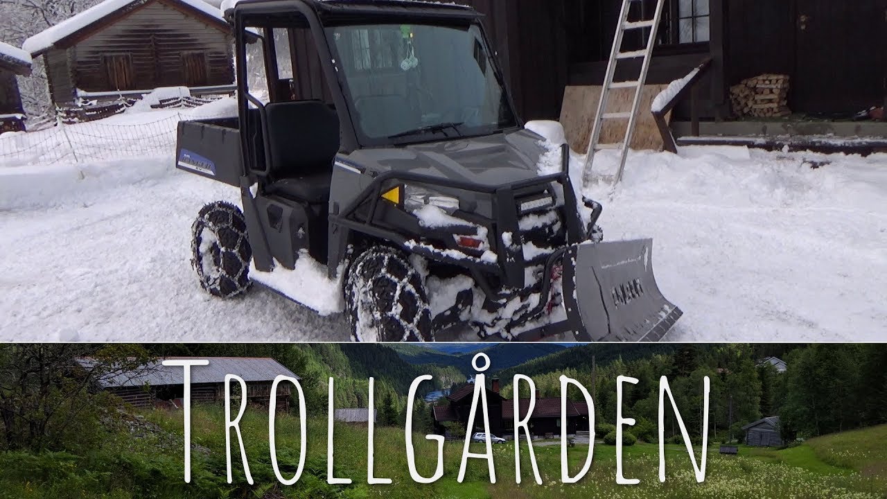 Polaris Ranger EV plowing some snow in Norway