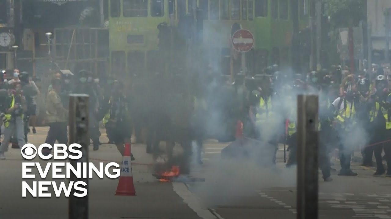 Pro-democracy protesters clash with police in Hong Kong over Beijing's proposed law