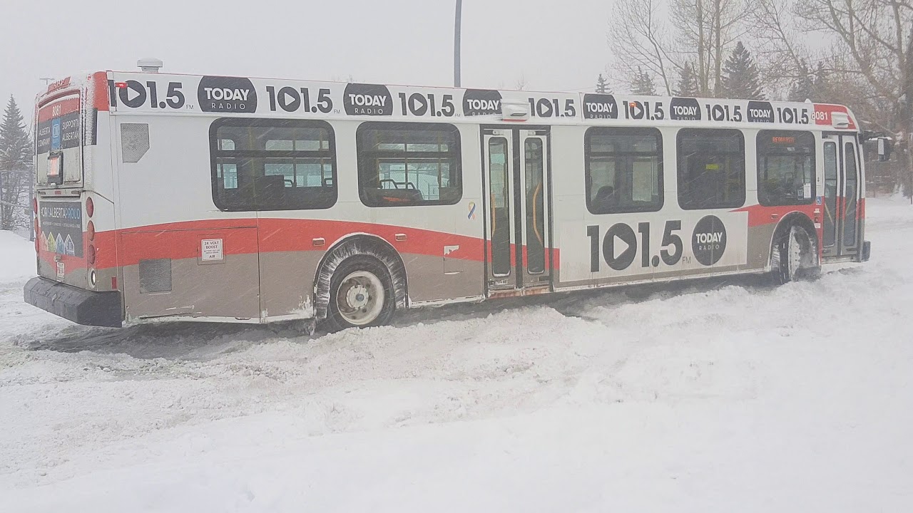 Calgary Transit bus sliding in snow.