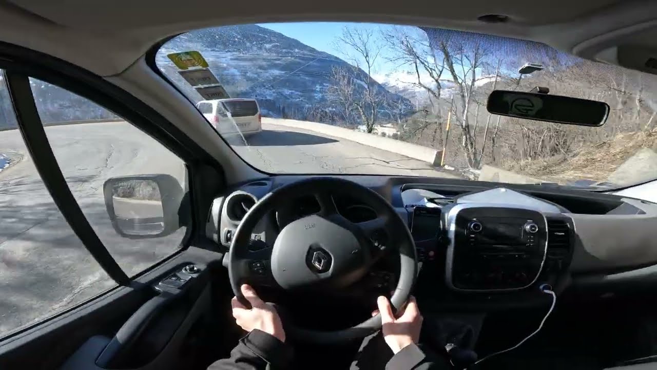 Driving from lac du Chevril to Sainte Foy. French alps. Winter. Renault Traffic cockpit POV