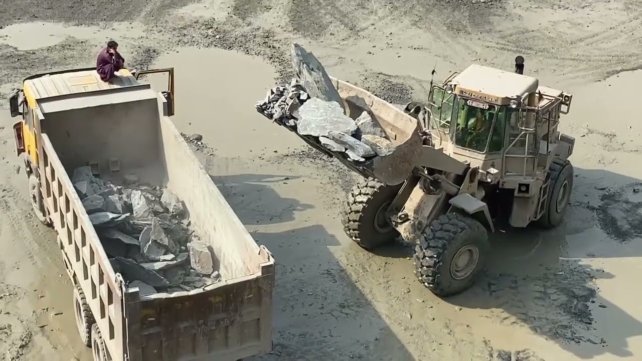 WorkingMassive Caterpillar Loader Loading Giant Rocks in Dump Truck | Quarry Machines