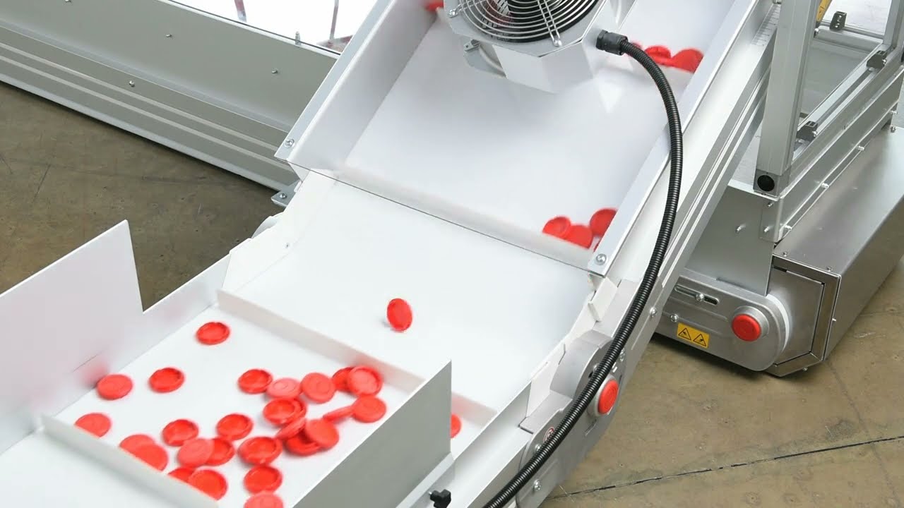 Nastro con tappeto modulare e raffreddamento - Modular plastic belt conveyor with air cooling system