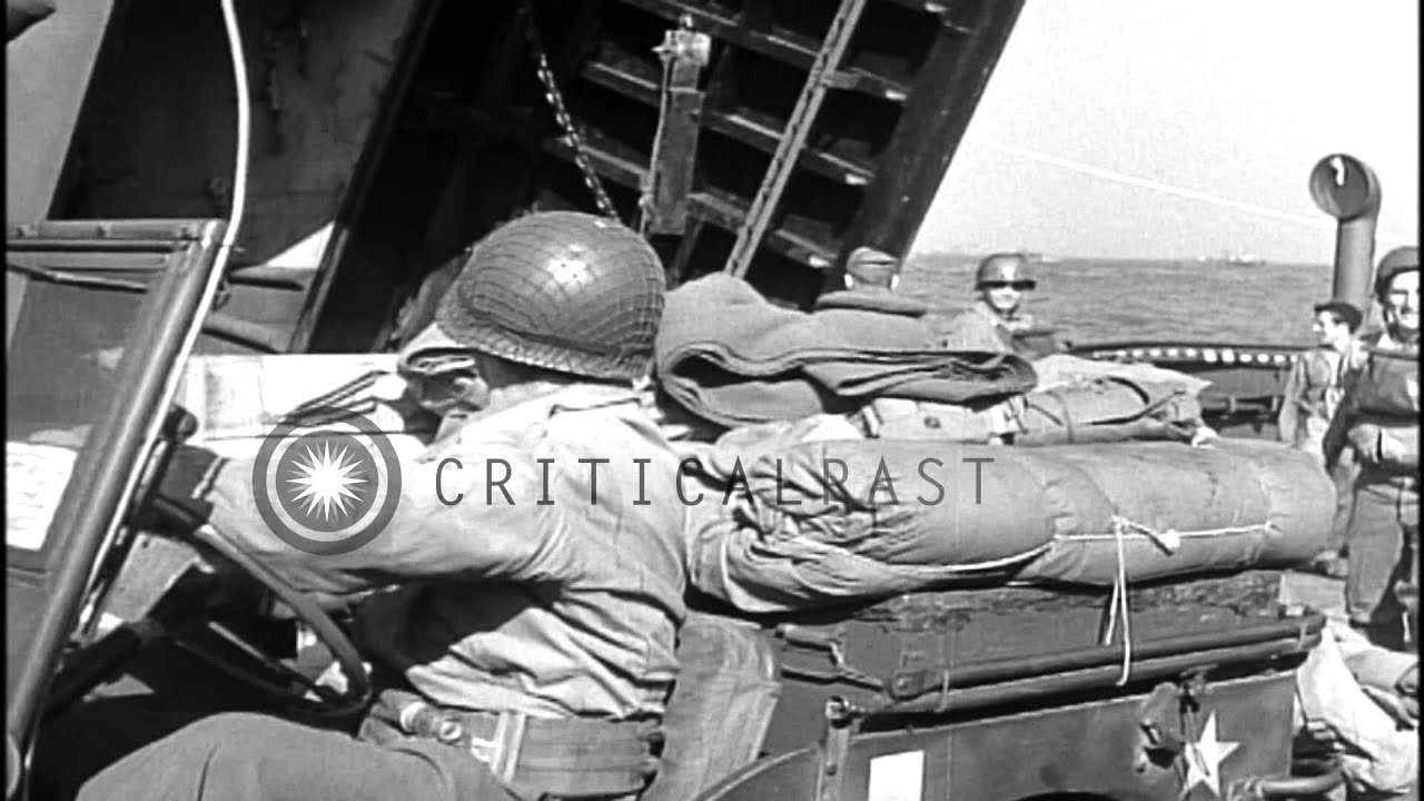 Jeeps offload from a Landing Craft Vehicle at the Omaha Beach in France also carr...HD Stock Footage
