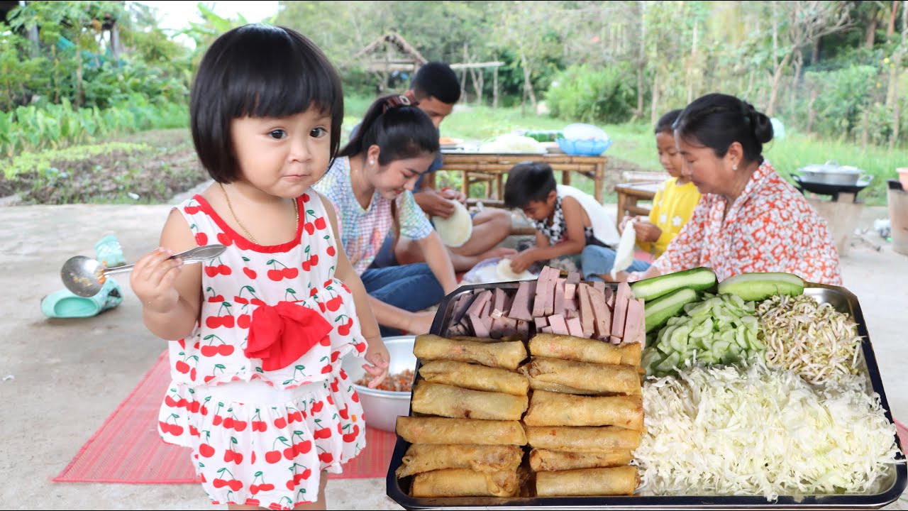 Cute girl Siv Chhee help us to make yummy spring rolls with noodle / Cook and Eat