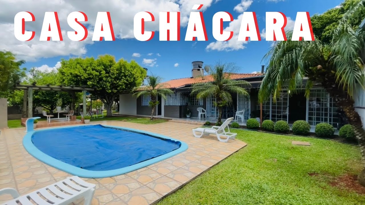 Olha que TERRENO GRANDE com pomar piscina CASA três quartos QUIOSQUE Maravilha SC R$ 850 mil