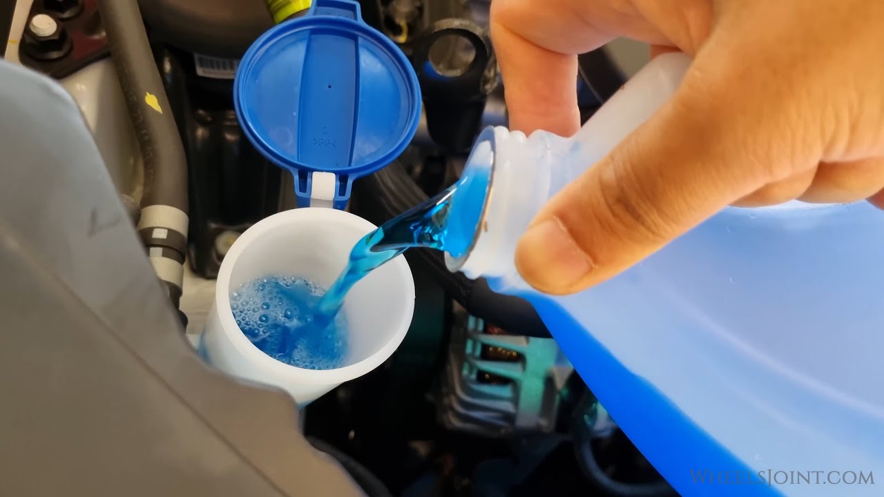 How to refill windshield washer fluid in Kia Sportage