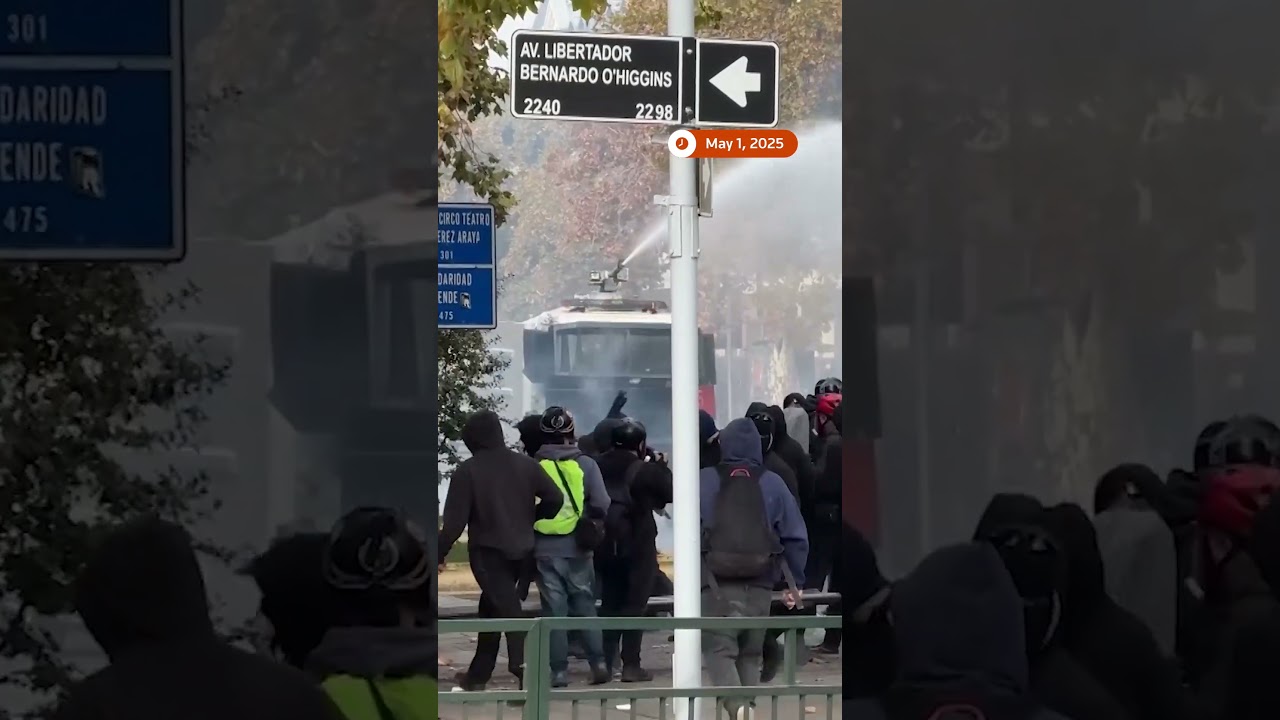 Chilean police disperse May Day protesters with water cannons | REUTERS