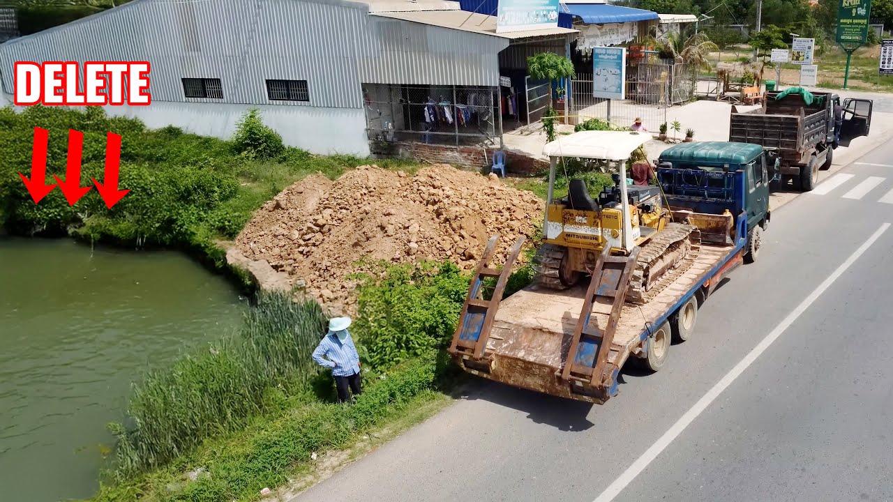 Started on the pond filling project​!! Mini Bulldozer Pushing Soil into water with 5ton truck