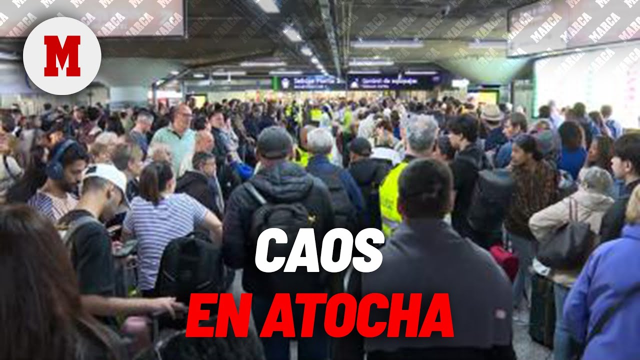 Largas colas y caos en Atocha  MARCA
