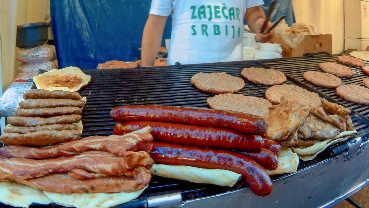 Serbia Street Food. Handmade Burgers and more Meat on Grill