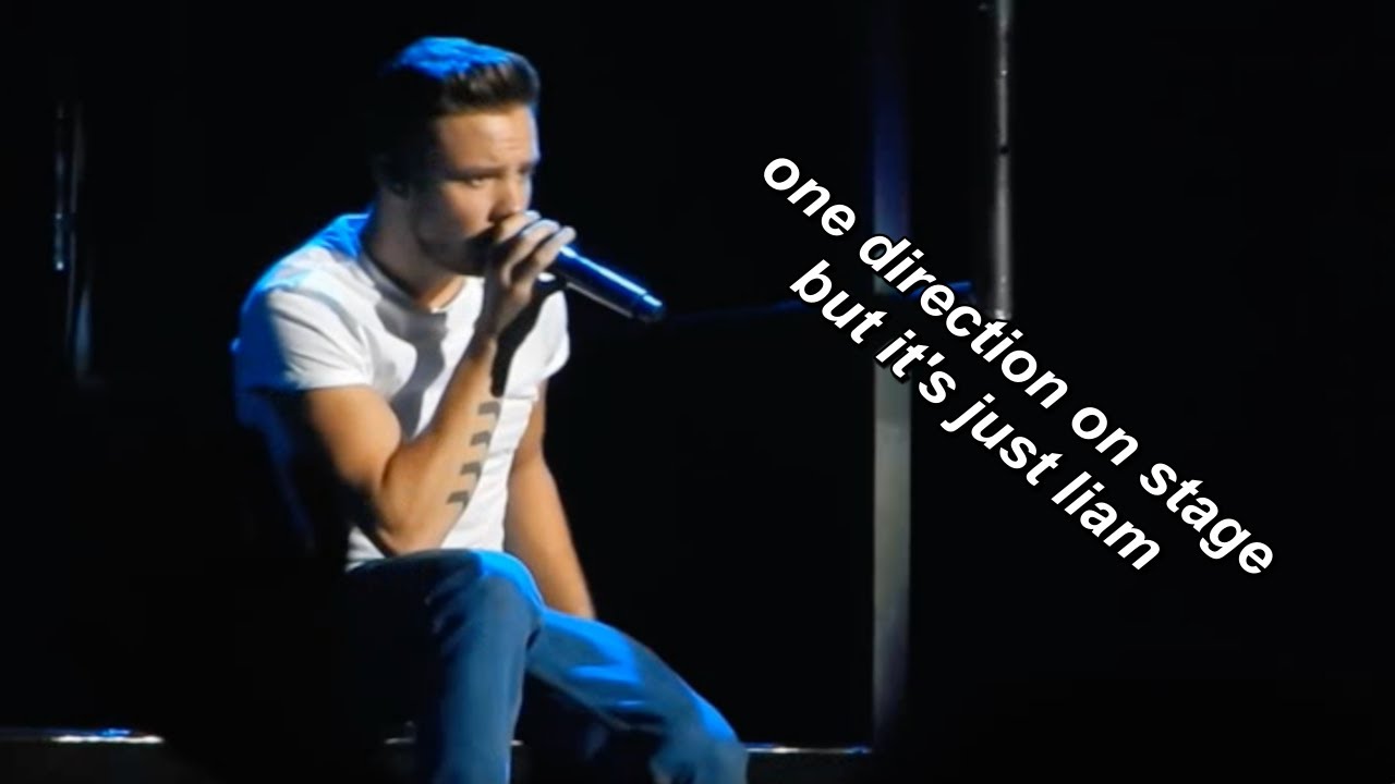 one direction on stage but it's just liam payne