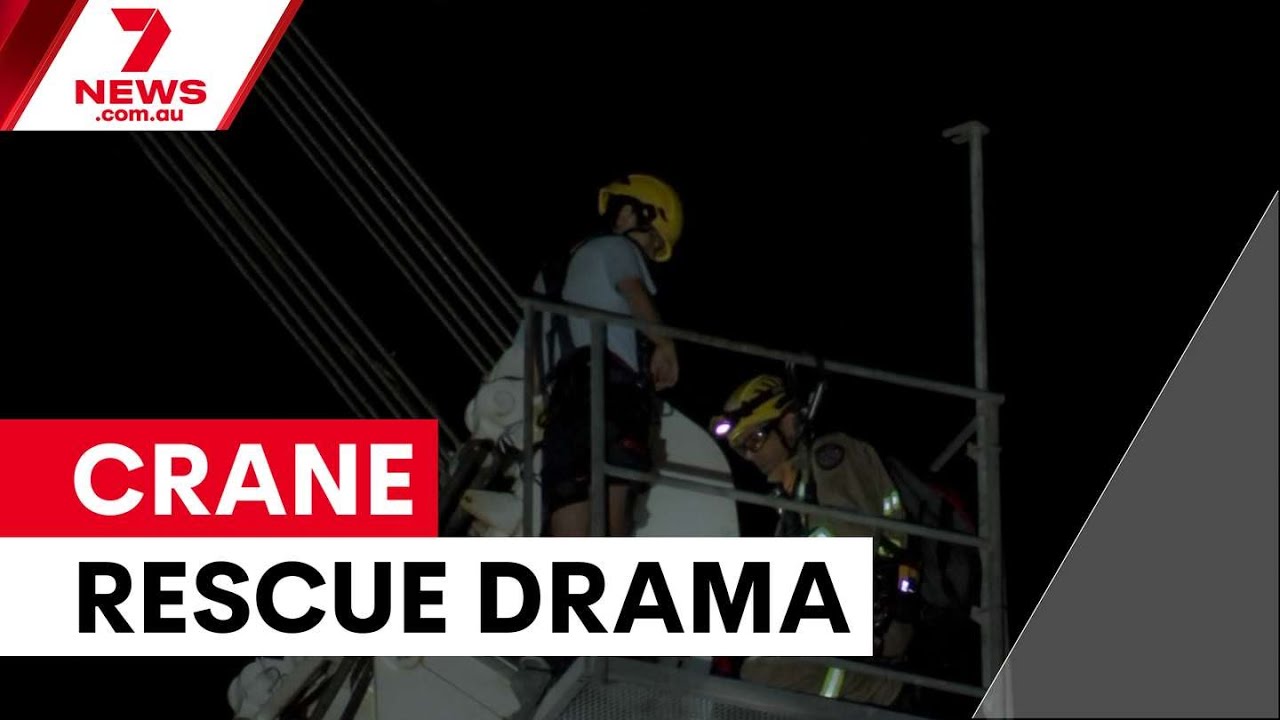 Teenager rescued from 30-metre crane in Melbourne | 7NEWS