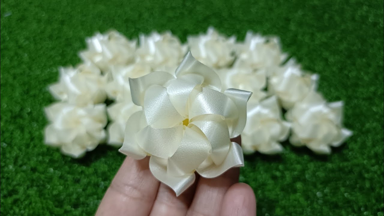 วิธีพับเหรียญโปรยทานดอกบัว