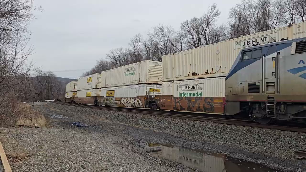 Eastbound Pennsylvanian and westbound intermodal trains meet at Lewistown, PA (02/26/2026)