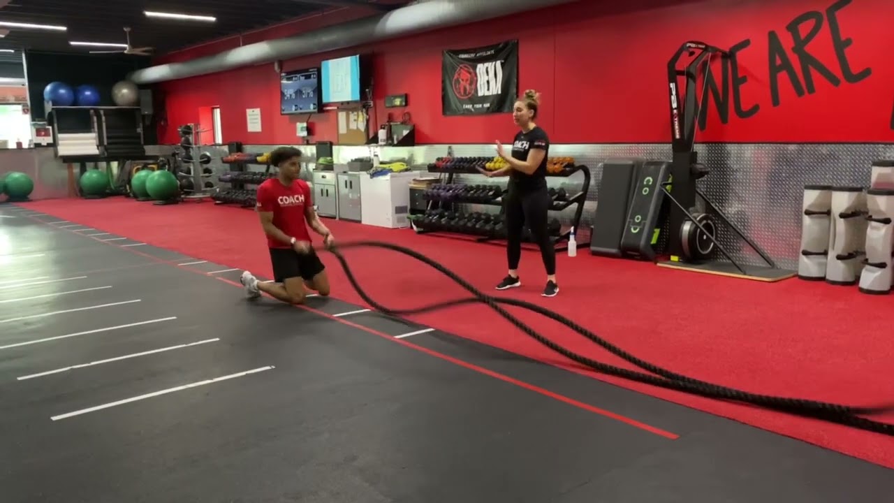 Battle Rope: Kneel to Stand Drum Roll to Walking Criss Cross