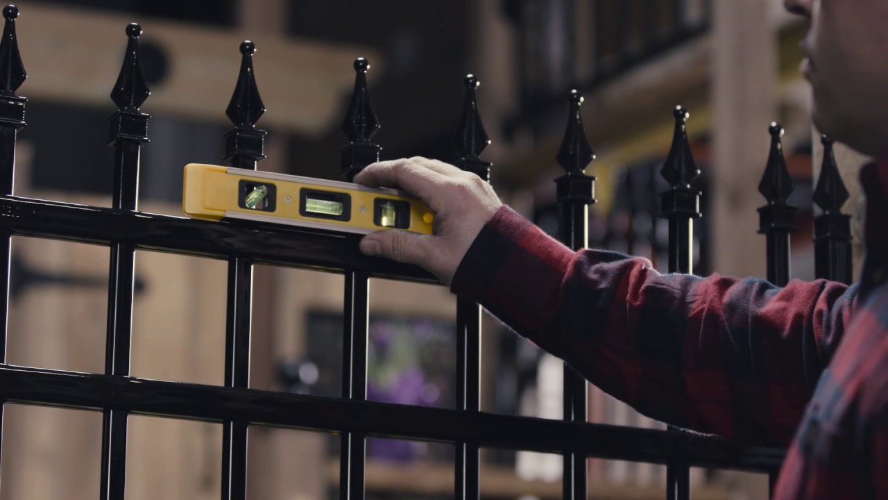 Installing a Metal Gate Between Wooden Posts