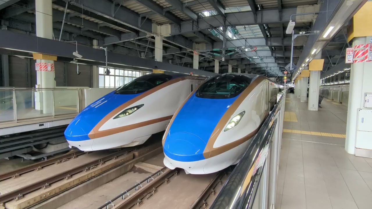 2026年3月10日北陸新幹線金沢(駅)12番のりば停車中 W7系W21編成運行12Eつるぎ12号→(回送列車)回送2201E 13番のりば着発 E7系F40編成運行3507Eかがやき507号