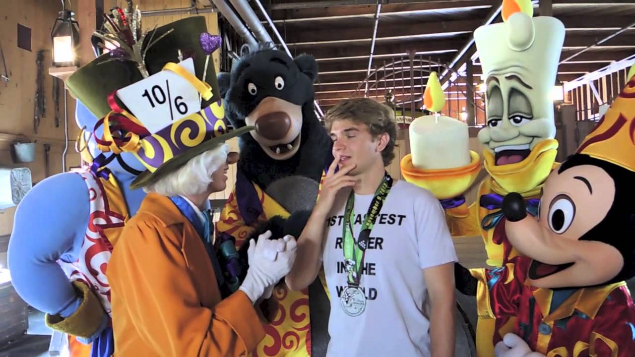 Mad Hatter. Lumiere, Genie, Goofy, Minnie, Mickey, Baloo, King Louie meet Tommy before parade