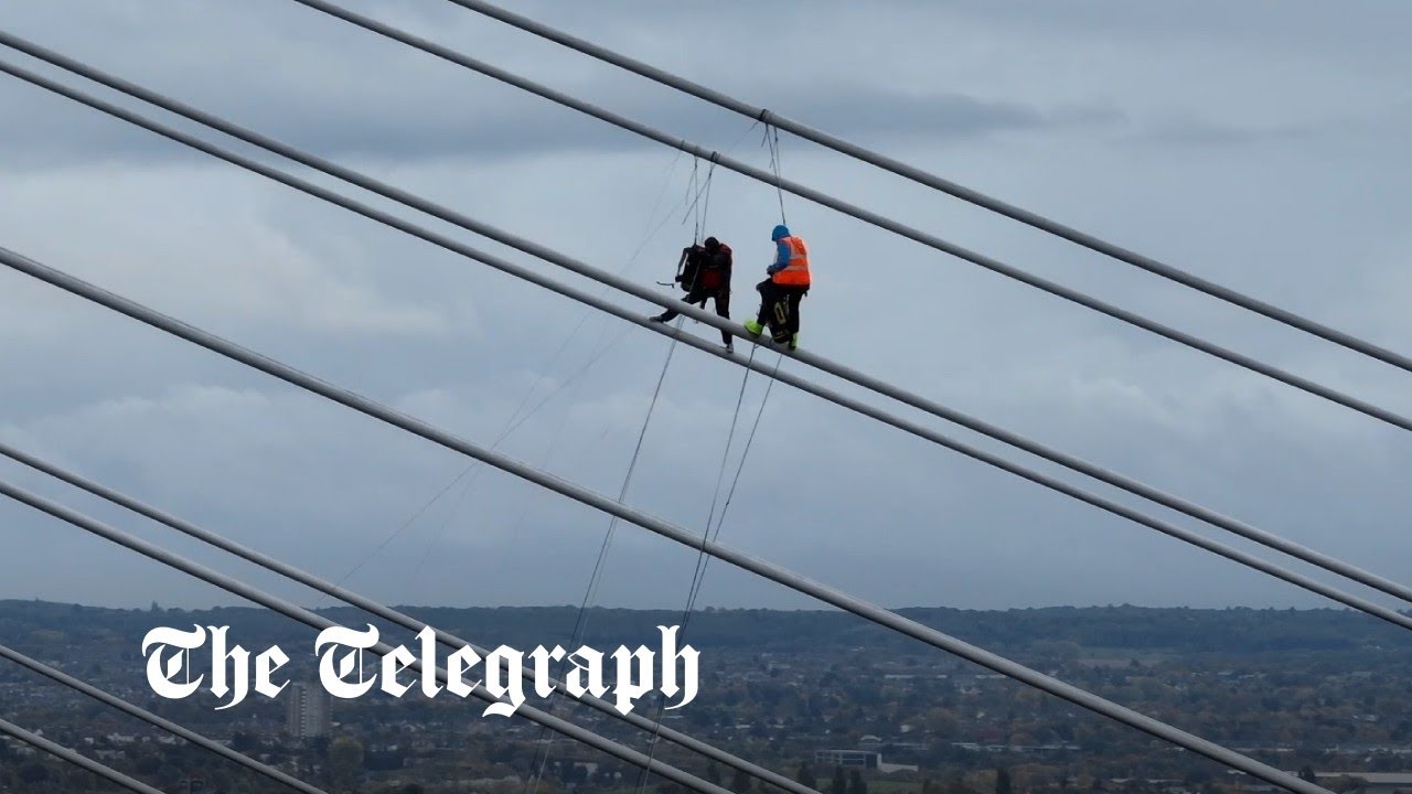 Just Stop oil protesters scale QE2 Bridge at Dartford Crossing
