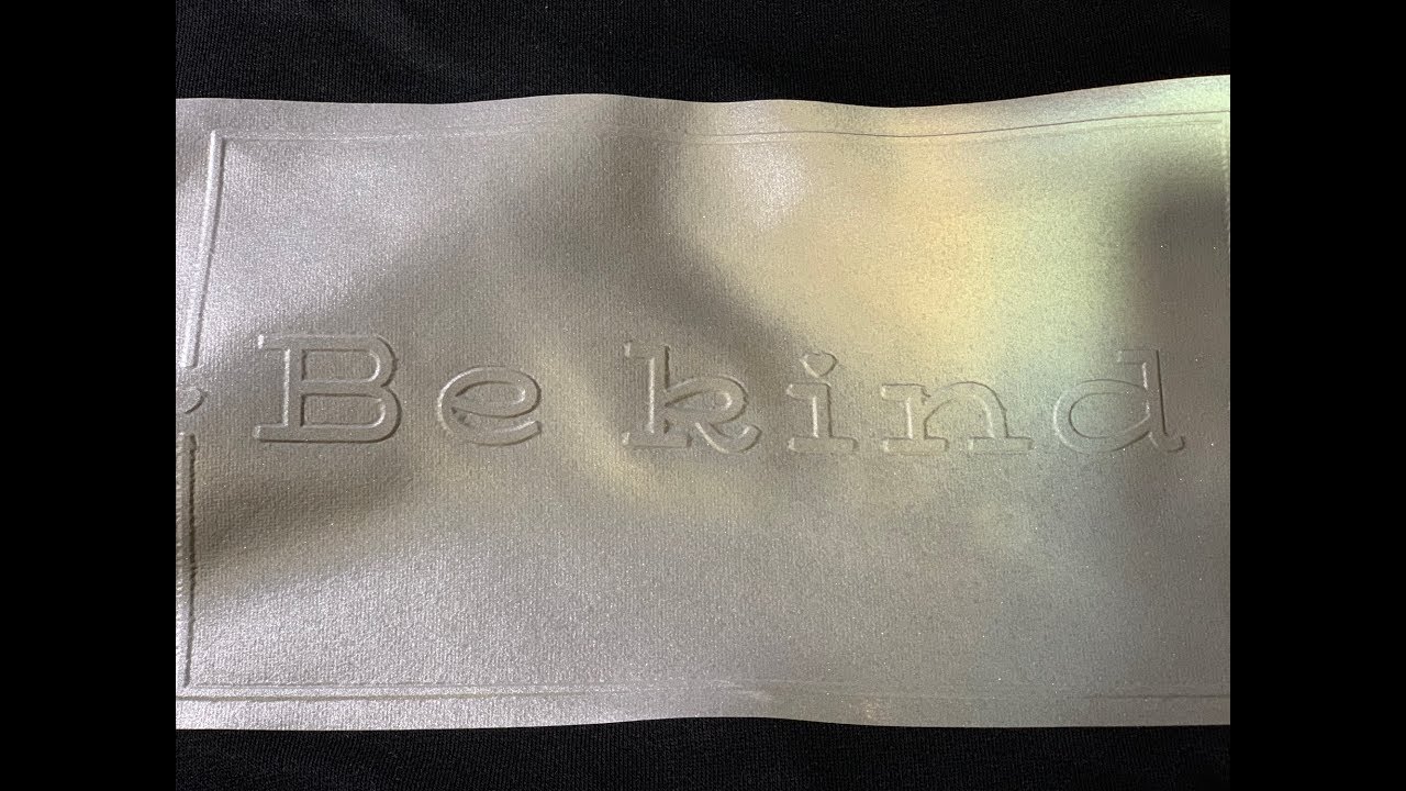 EMBOSSED IRON ON