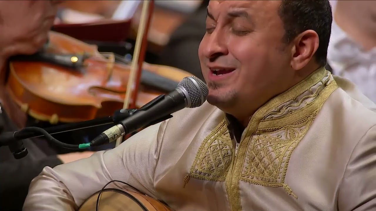 ABBAS RIGHI AVEC L ORCHESTRE SYMPHINIQUE  ALGERIEN ET L ORCHESTRE SYMPHONIQUE CHINOIS