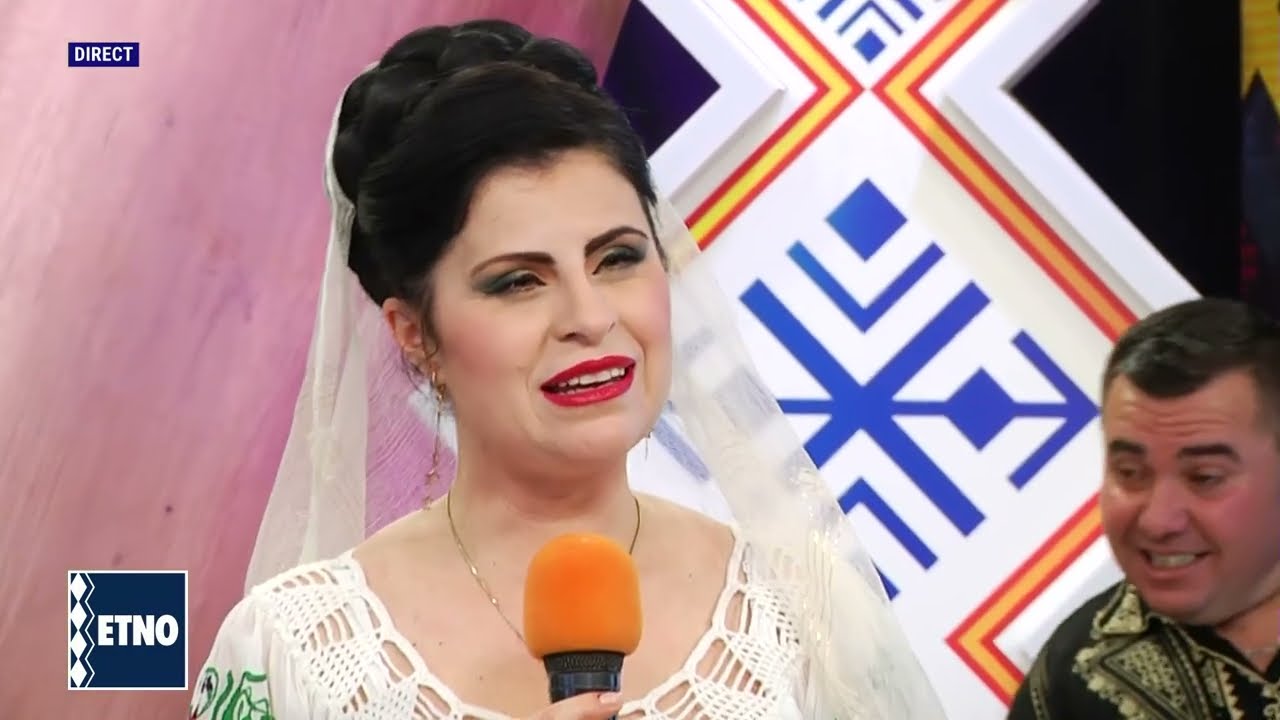 Simona Dinescu - Intr -un sat e o casuta