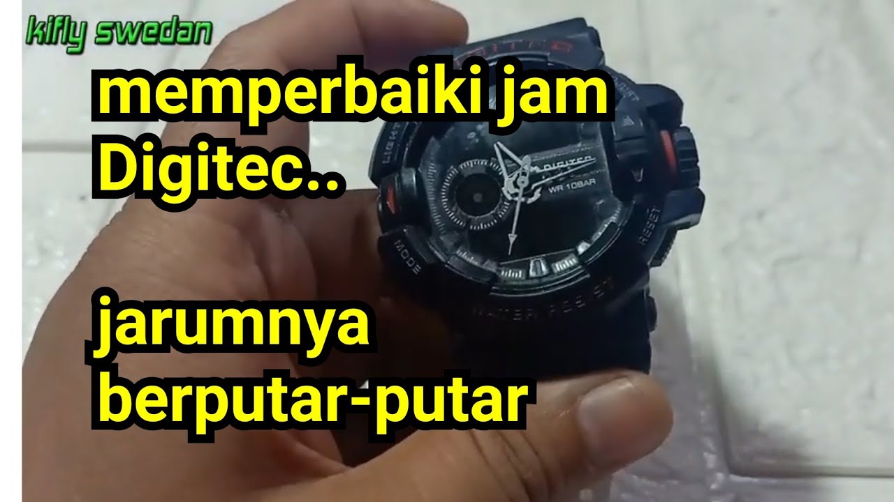 memperbaiki jam tangan  jarum berputar putar .