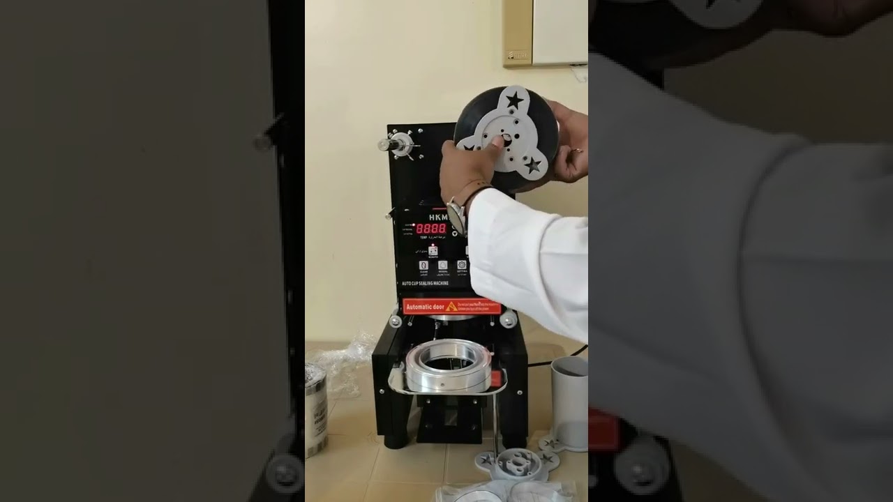 آلة تغليف كاسات العصير cup sealing machine HKMIRG