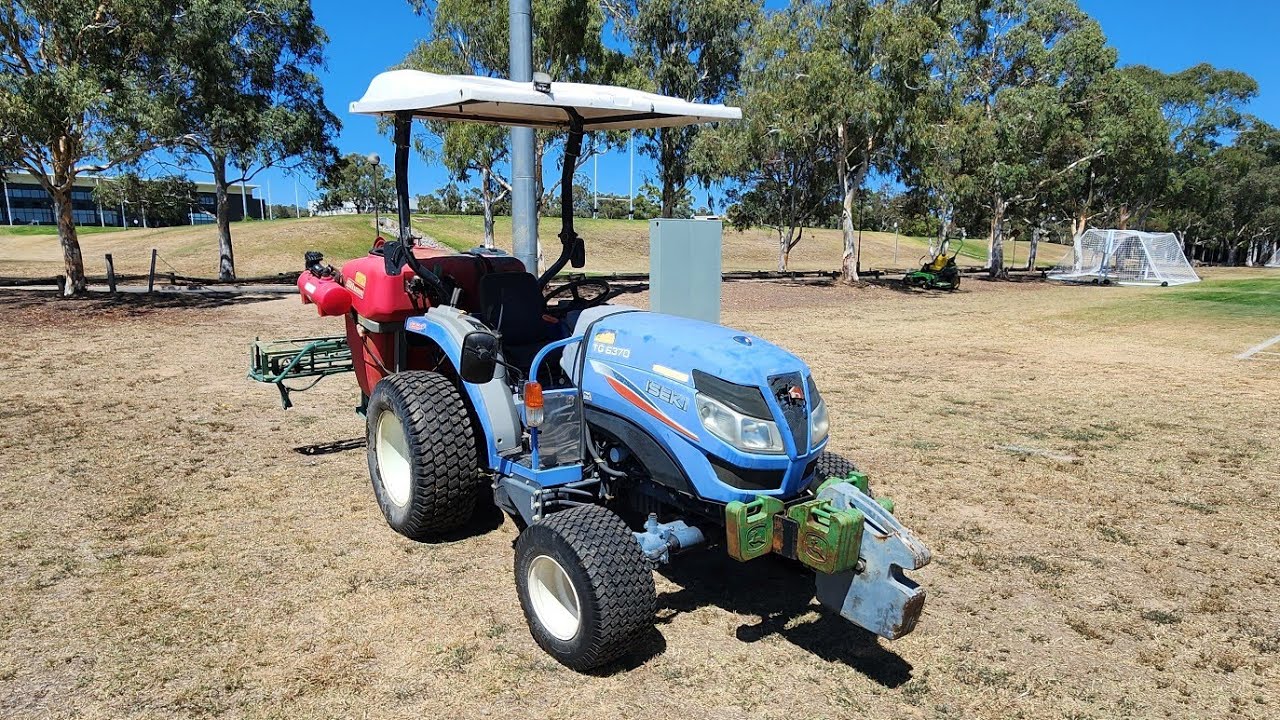Watering the Saplings with the Iseki TG6370 Compact Tractor