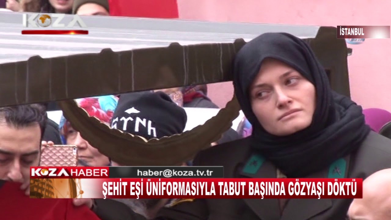 ŞEHİT EŞİ &Uuml;NİFORMASIYLA TABUT BAŞINDA G&Ouml;ZYAŞI D&Ouml;KT&Uuml;