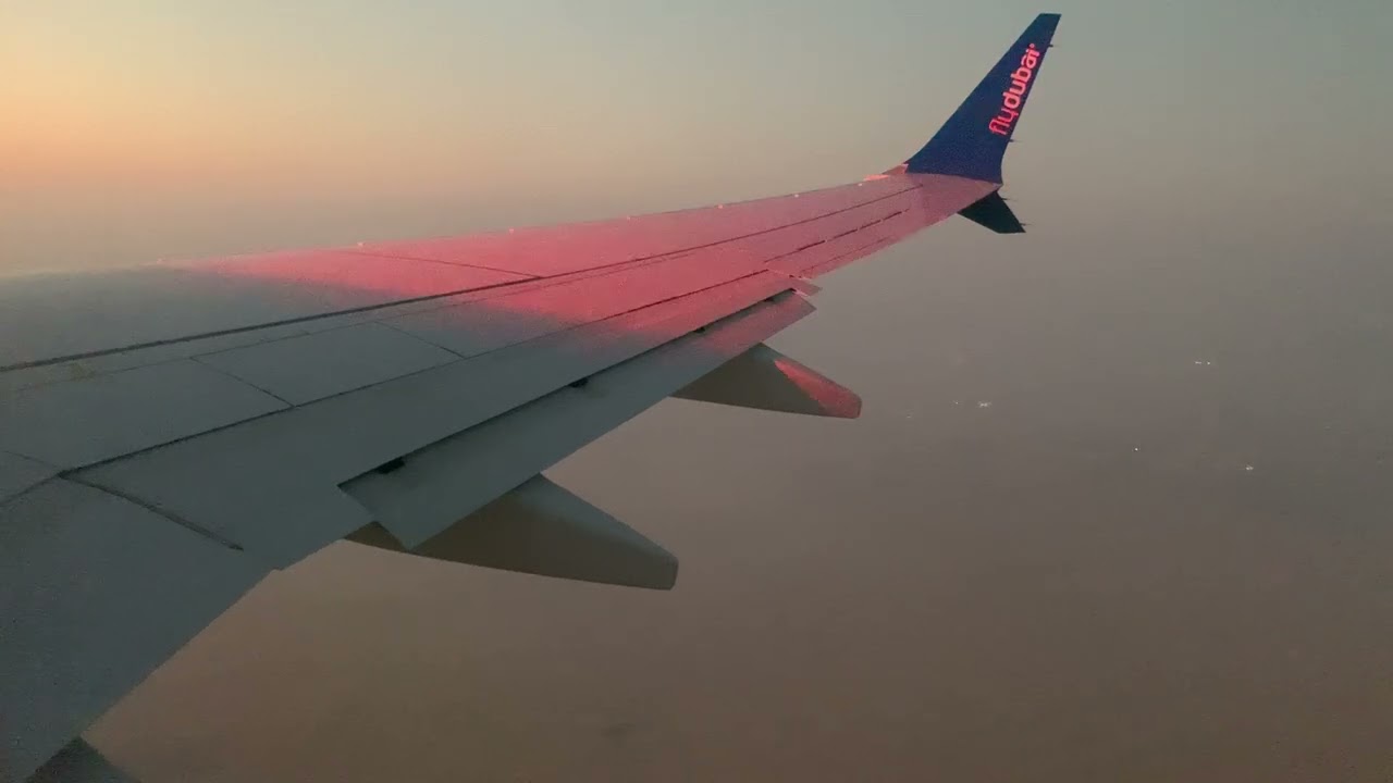 FlyDubai 737MAX8 beautiful approach and landing over all sights of Dubai at sunrise