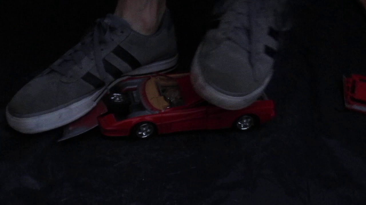 My hot boyfeet crushing another modelcar in my low Adidas sneakers