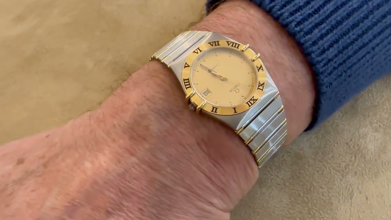 Montre Omega Constellation (Ref 13101000) en or jaune 18 Cts et acier.Quartz. 33mm