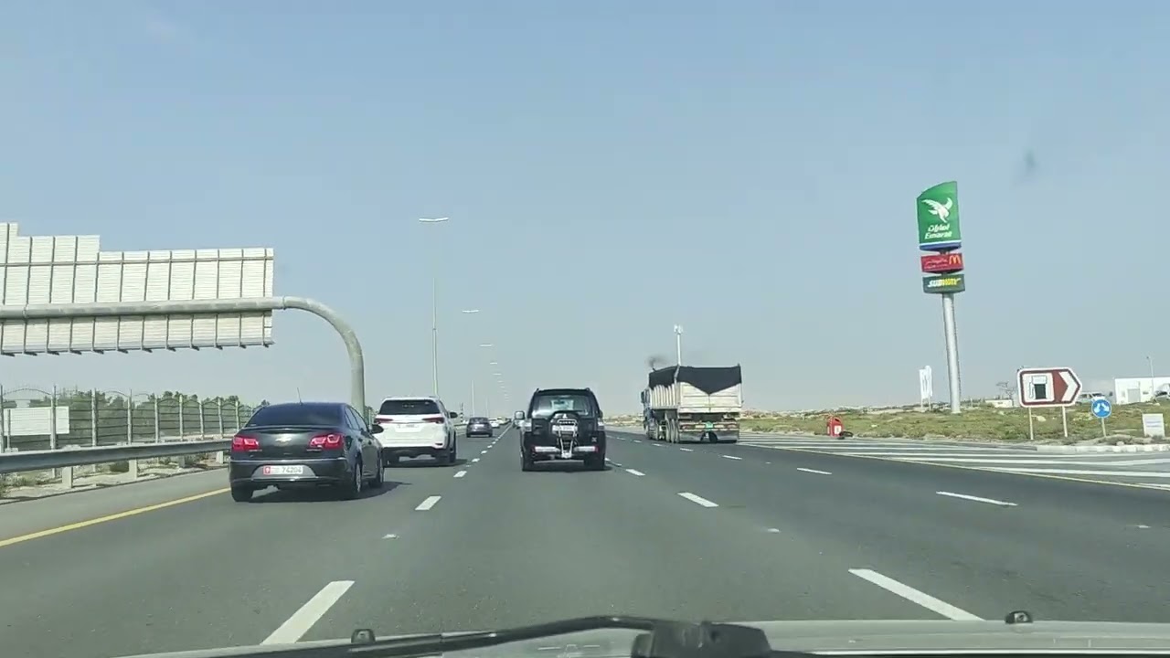 Morning car drive from Dubai Jebel Ali to Abu Dhabi YAS island