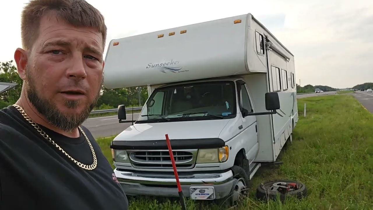 HOW TO CHANGE A FORD E450 FLAT TIRE