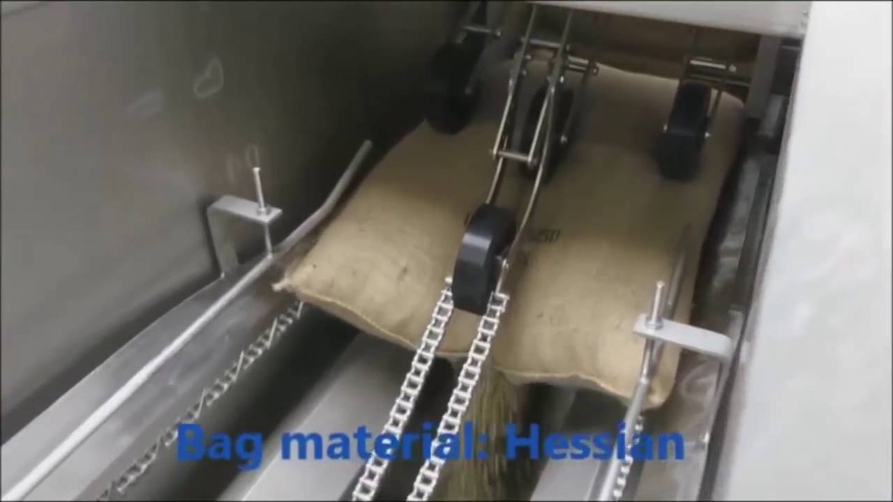 Bag slitting and emptying equipment