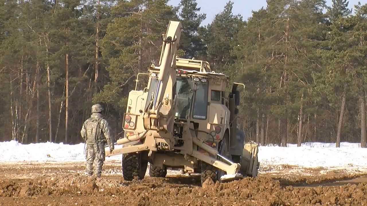 Army Engineer in Action: High Mobility Engineer Excavator; Motor Grader; DV100 DEUCE
