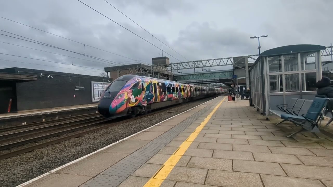 The class 66 and the class 390 and the class 807 010 at Stafford station for 2026